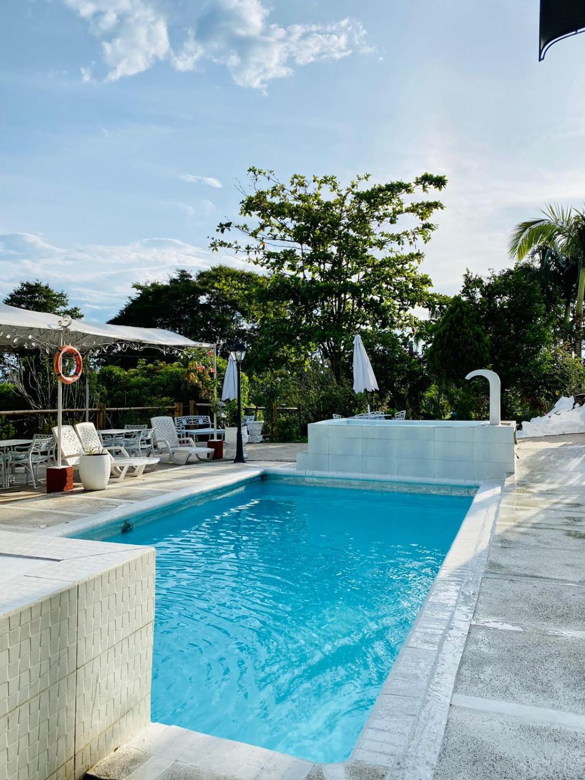 Hotel West California Puerto Espejo Екстериор снимка